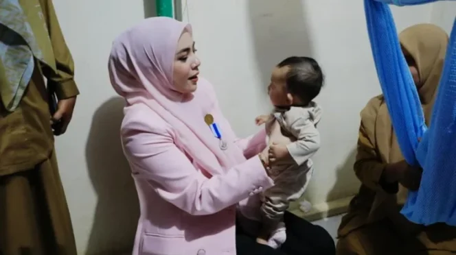 
					Bunda PAUD Kota Lhokseumawe, Ny. Yulinda Sayuti, melakukan monitoring ke sejumlah Tempat Penitipan Anak (TPA), Selasa 28 April 2026. (dok/humas).